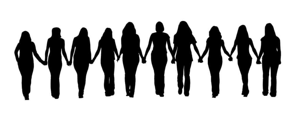 Silhouette of ten young women, walking hand in hand.